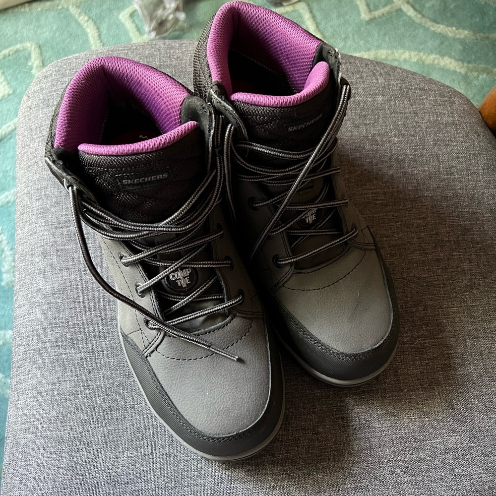 Steel toe boots slip resistant bottoms.